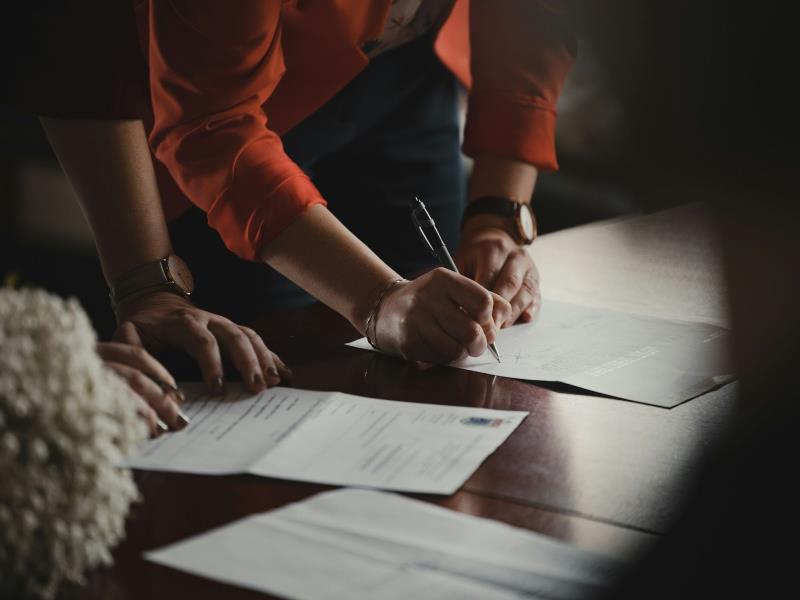 Person signing a lease