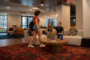 roommates hanging out in apartment clubhouse