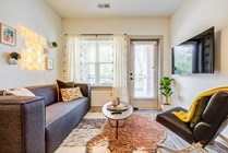 Signature-Hartwell-Village-Off-Campus-Apartments-Near-Clemson-University-Fully-Furnished-Living-Room-with-Balcony-Access