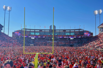 students storming the field